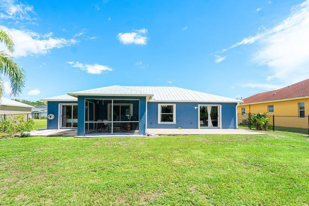 Photo of 5950 NW Culebra Avenue, Port Saint Lucie, FL 34986 (MLS # R11100172)