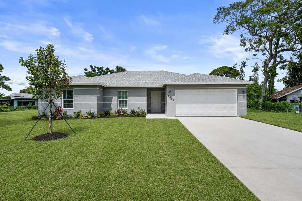Photo of 7002 Paso Robles Boulevard, Fort Pierce, FL 34951 (MLS # B26061182)