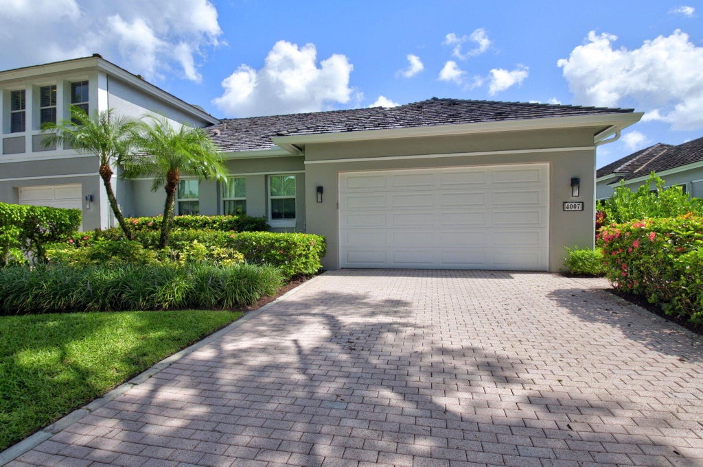 Photo of 4007 NW 58TH Place, Boca Raton, FL 33496 (MLS # B26053195)