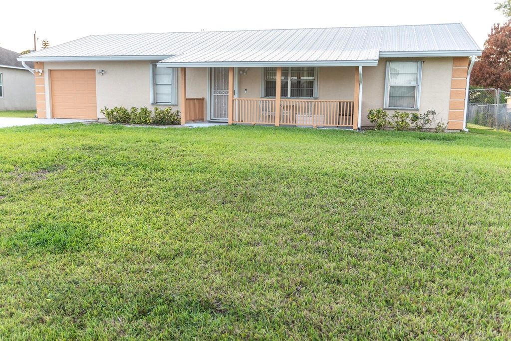 Photo of 662 NW Bayshore Boulevard, Port Saint Lucie, FL 34983 (MLS # B26018695)