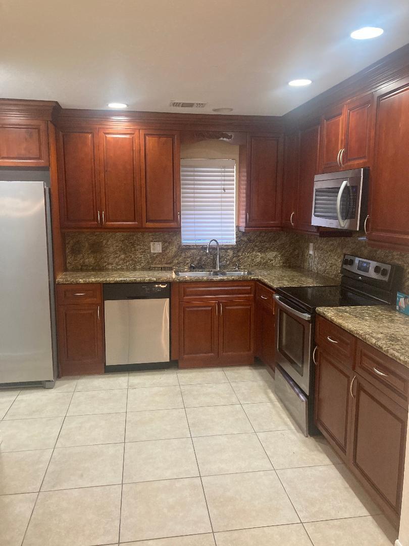 Photo of 1950 COQUINA Way, Coral Springs, FL 33071 (MLS # B26080116)