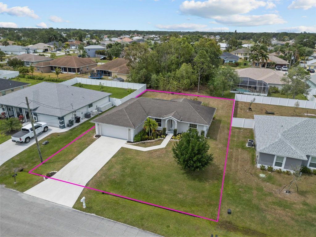 Photo of 6166 NW East Deville Circle, Port Saint Lucie, FL 34986 (MLS # R10975309)