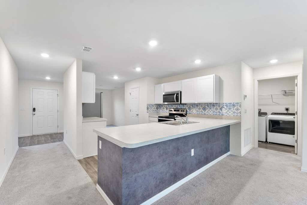 Photo of 619 SW Hamberland Avenue, Port Saint Lucie, FL 34953 (MLS # B26063962)