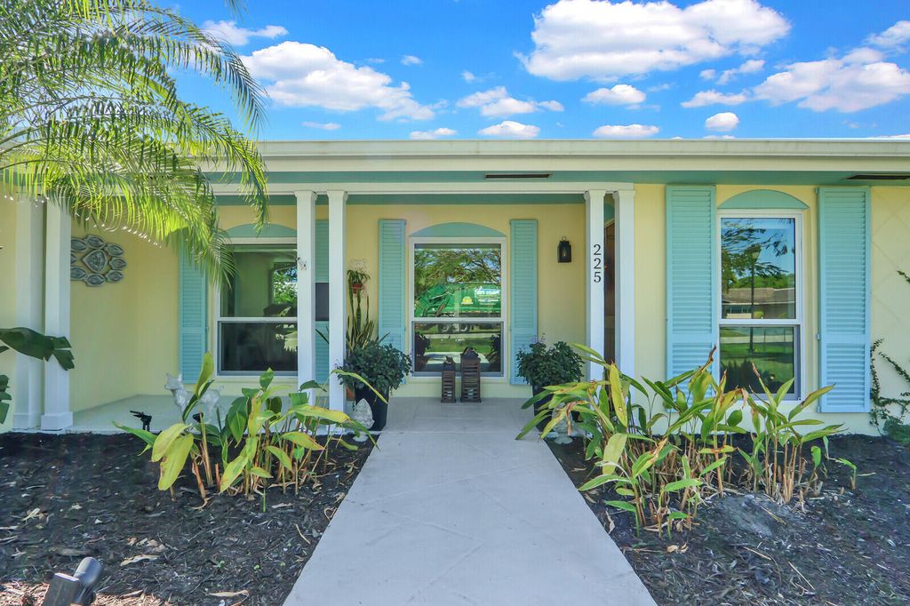 Photo of 225 Orange Tree Dr, Atlantis, FL 33462 (MLS # B26000679)