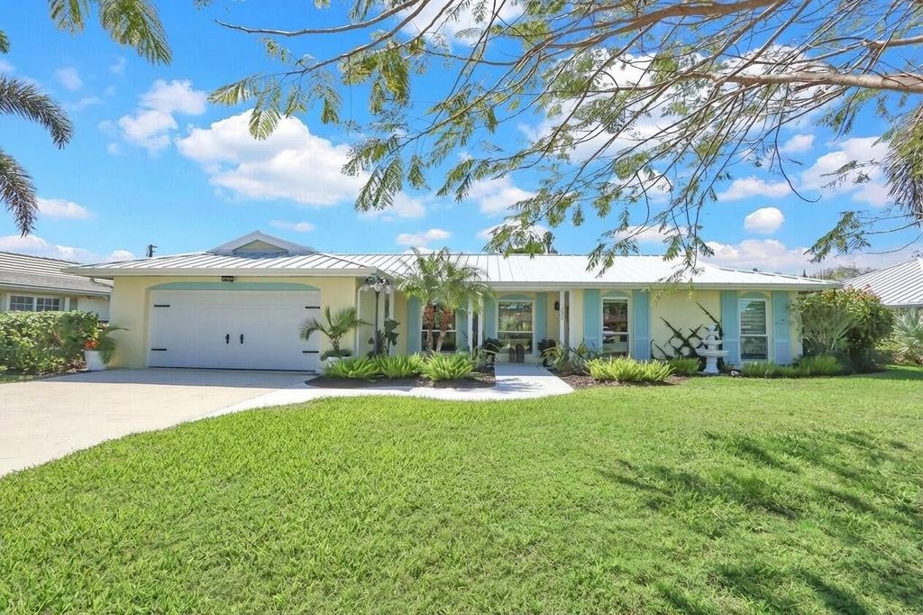 Photo of 225 Orange Tree Dr, Atlantis, FL 33462 (MLS # B26000679)