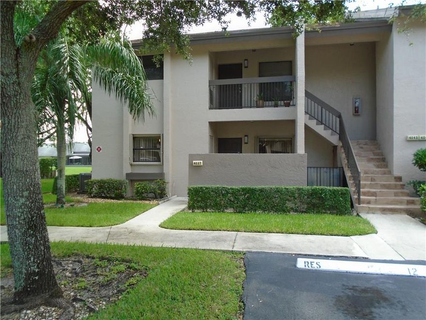 ***ONE OF THE MOST DESIRED VILLAGES IN THE TOWNSHIP WITH A UNIQUE FLOOR PLAN***   THIS UNIT IS THE ONLY MODEL THAT THE TOWNSHIP HAS TO OFFER WITH BOTH A SCREENED IN PATIO IN THE BACK AND A LARGE PRIVATE PATIO IN THE FRONT.  UNIT COMES WITH TILED FOYER, KITCHEN, DINING AND BACK PATIO WITH CARPET IN LIVING AND WOOD FLOORS IN BEDROOMS, A/C 2 YEARS OLD, REMODELED KITCHEN, UPGRADED LIGHTING AND CEILING FANS, HURRICANE SHUTTERS THROUGHOUT UNIT, GLASS ENCLOSED SLIDING DOORS IN BACK OVERLOOKING LAKE.