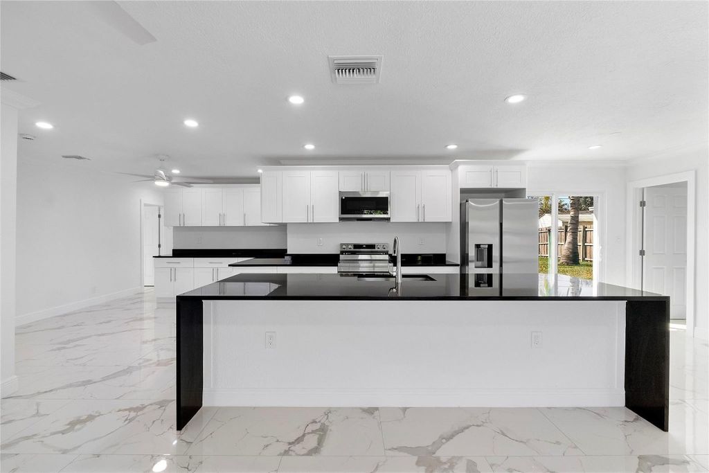 Photo of 1411 NW 54th Terrace, Lauderhill, FL 33313 (MLS # F10548990)