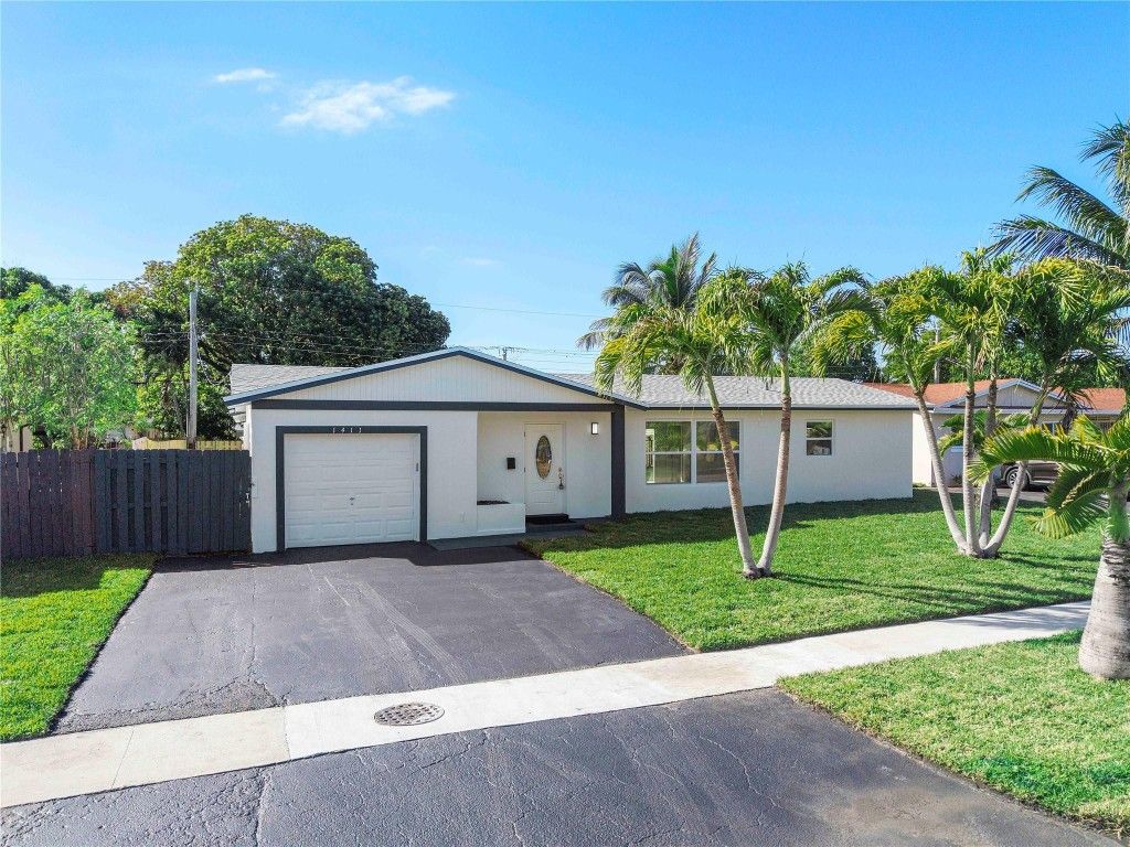 Photo of 1411 NW 54th Terrace, Lauderhill, FL 33313 (MLS # F10548990)