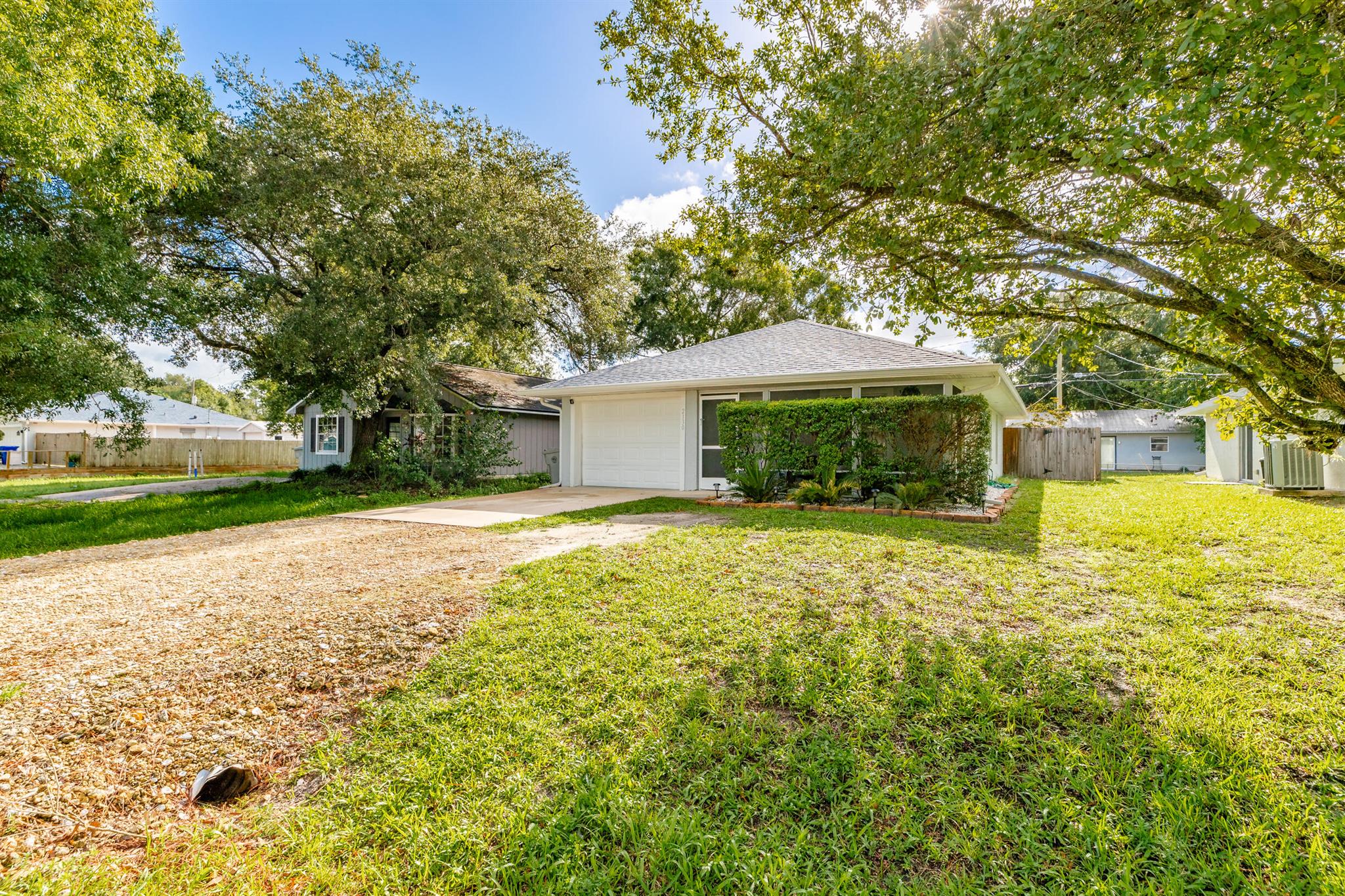 Wonderful location with easy commutes on I-95 and 20 minutes to the beach with NO HOA. CBS with stucco construction features 2 bedrooms, a den/office and 2 bathrooms with a single car garage and additional driveway parking . Tile floors in the common areas and 2023 installation of waterproof vinyl flooring in the bedrooms. Upgrades include 2023 roof/ gutters, 2020 fenced yard, 2021 screened porch, 2019 AC with UV light, 2021 water heater, 2019 SS kitchen appliances, 2023 kitchen renovation and 2023 energy efficient window tinting. Bring your toys and store them at the home without any issues.