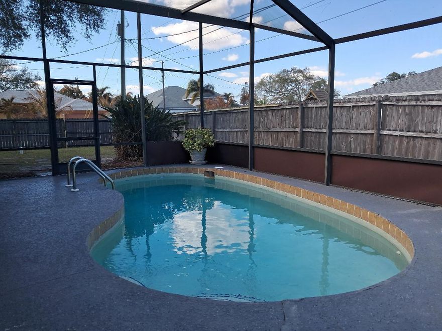 Move in ready covered patio Pool home, corner lot with fence yard. owner takes care of lawn and pool service. newer stainless steel appliances, extra newer fridge in garage.