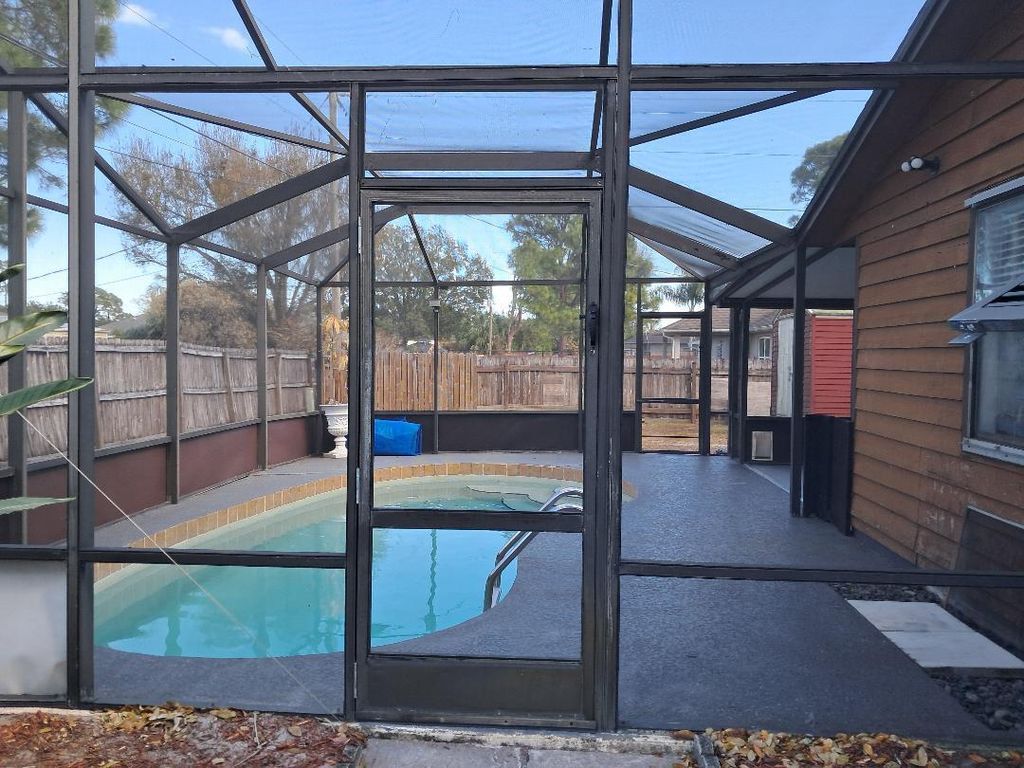 Photo of 121 SE Juper Avenue, Port Saint Lucie, FL 34983 (MLS # R11164926)