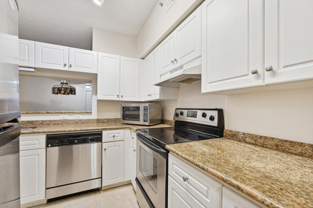 Photo of 2120 Tuscany Way, Boynton Beach, FL 33435 (MLS # B26027863)