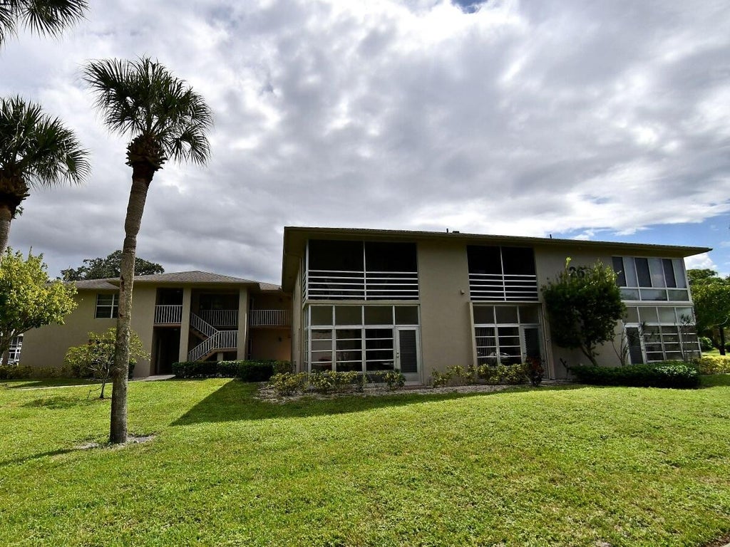 Photo of 26 Lake Vista Trail #105, Port Saint Lucie, FL 34952 (MLS # B26080360)