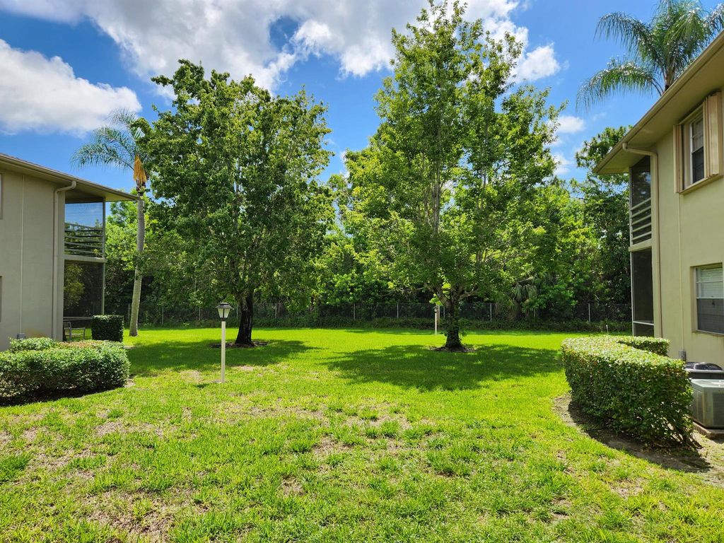 Photo of 17 Lake Vista Trail #103, Port Saint Lucie, FL 34952 (MLS # R11000354)