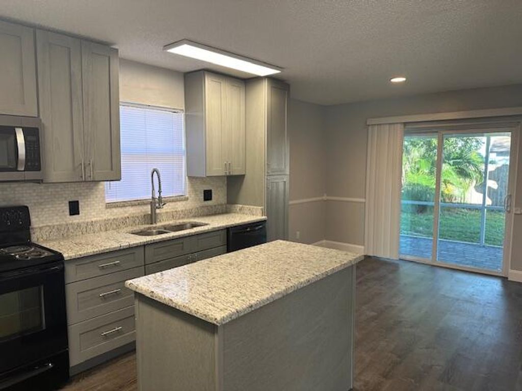 Photo of 5609 SE Katherine Avenue, Stuart, FL 34997 (MLS # R10952247)