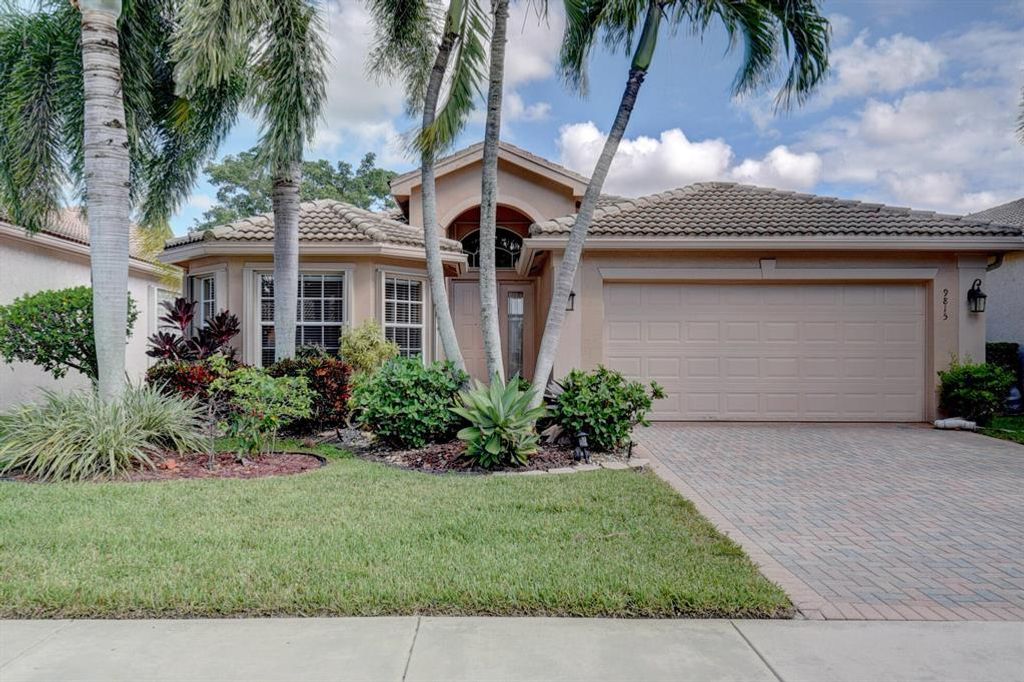 Photo of 9815 Tallyrand Drive Dr, Lake Worth Beach, FL 33467 (MLS # R10748992)