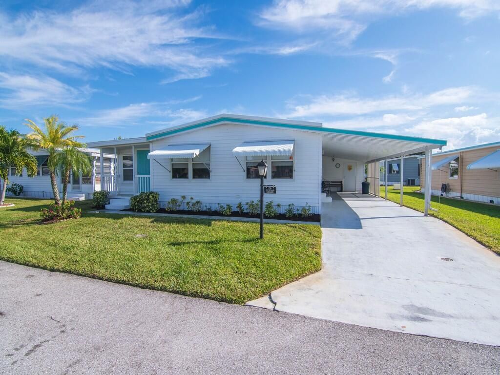 Photo of 236 NE Sunshine Lane, Jensen Beach, FL 34957 (MLS # R11143283)