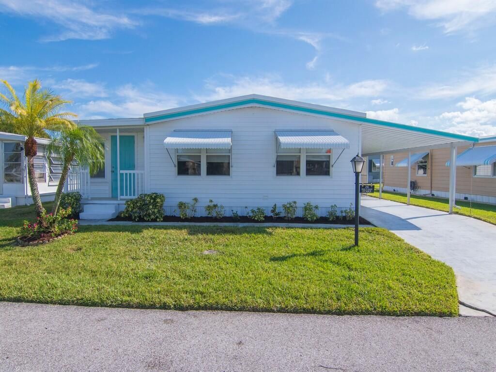 Photo of 236 NE Sunshine Lane, Jensen Beach, FL 34957 (MLS # R11143283)