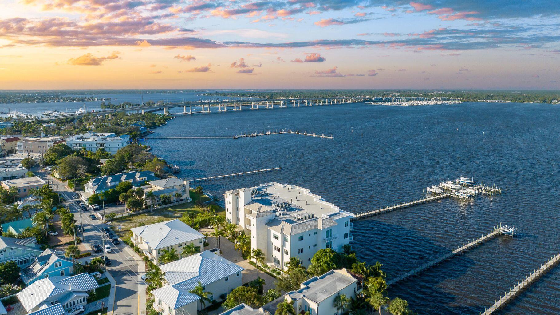 Discover luxury living in this beautifully designed townhouse in the heart of downtown Stuart. This elegant residence features a chef's kitchen with quartz countertops, high-end appliances, and custom cabinetry. The spacious bedrooms and spa-inspired bathrooms offer comfort and style. Enjoy your private boat slip, secure two-car garage, and access to upscale amenities including a resort-style pool, lounge area, BBQ, and fire pit. Walk to the waterfront, fine dining, and boutique shopping. Third bedroom currently set up as an office but can be furnished as a bedroom. Direct Waterfront amenities. Seasonal rate applicable. 90-day minimum lease.