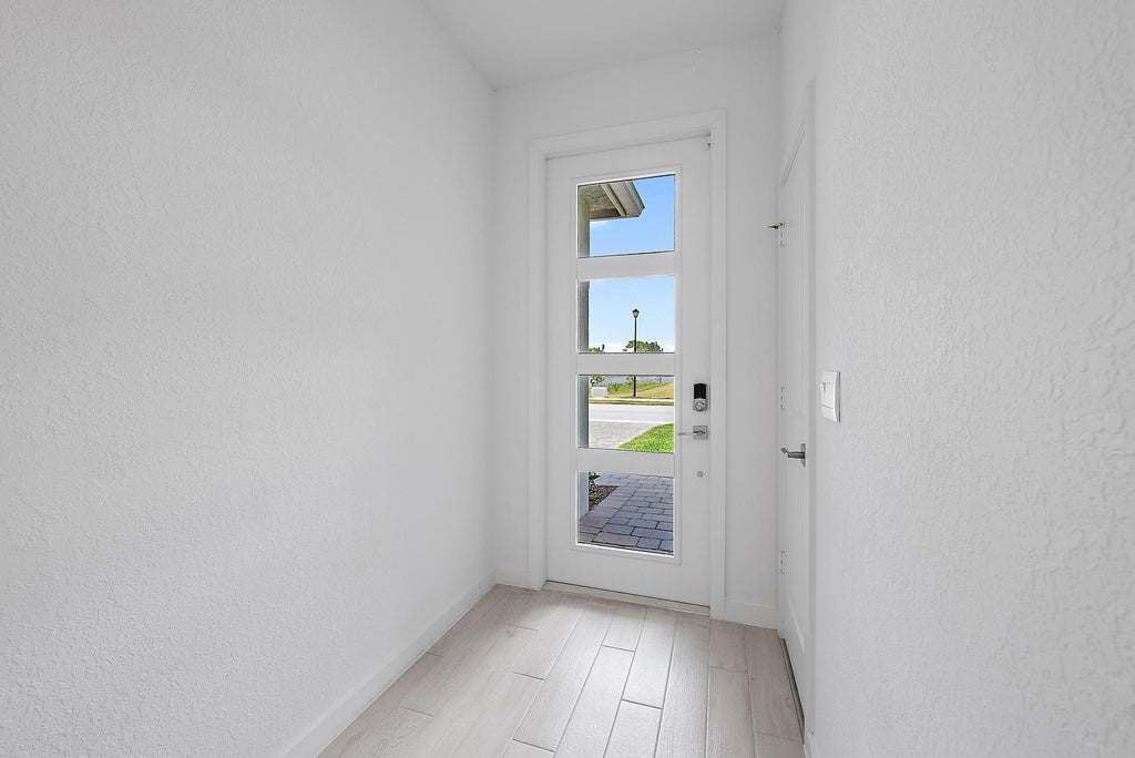 Photo of 5880 SE Sky Blue Circle, Stuart, FL 34997 (MLS # R11064139)