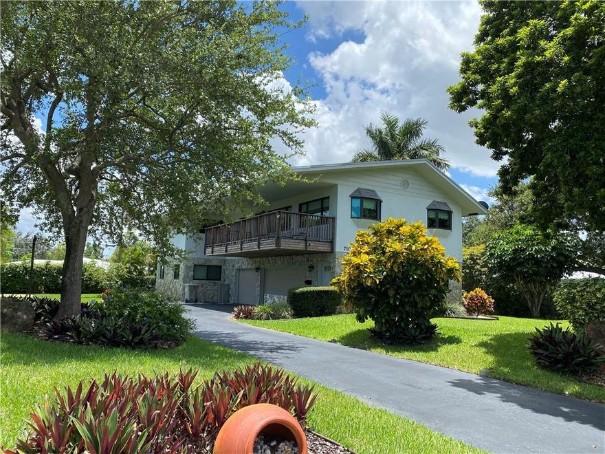 This unique custom built home has endless possibilities, currently a 2 bedroom,2 full bath and 2 half bath home with a 3 car garage.   This two story CBS home has an amazing 3,984 adjusted total sf.  Sooooo Bring your imagination and make this your dream home!!! All impact glass windows and hurricane grade garage doors.  The oversized lot( 11,790) has plenty of room for a pool or addition.   Upstairs is all open for a great room effect with all new wood look vinyl floors.   Downstairs is one very large bedroom which can easily be two bedrooms with a huge walk in closet.   There is also an unfinished room that can become a kitchen  which would be great as an Air B&B for extra income. Note: all original blueprints and drawings are available