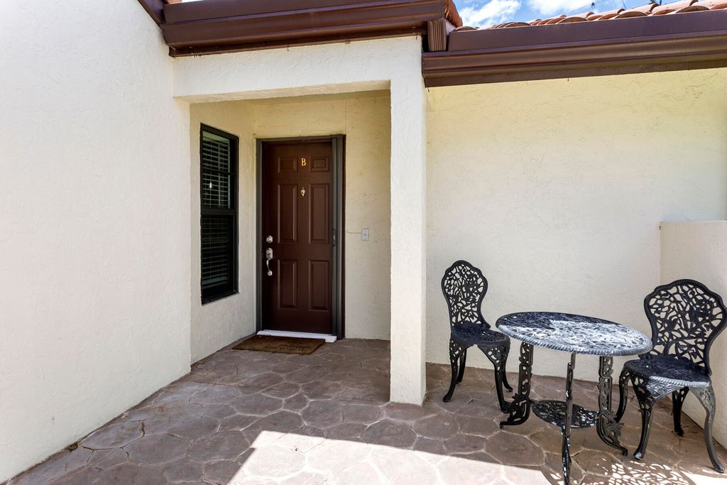 Photo of 10711 Palm Leaf Drive #B, Boynton Beach, FL 33437 (MLS # B26014935)