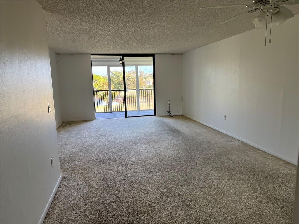 Photo of 3650 Environ Boulevard #308, Lauderhill, FL 33319 (MLS # B26030436)
