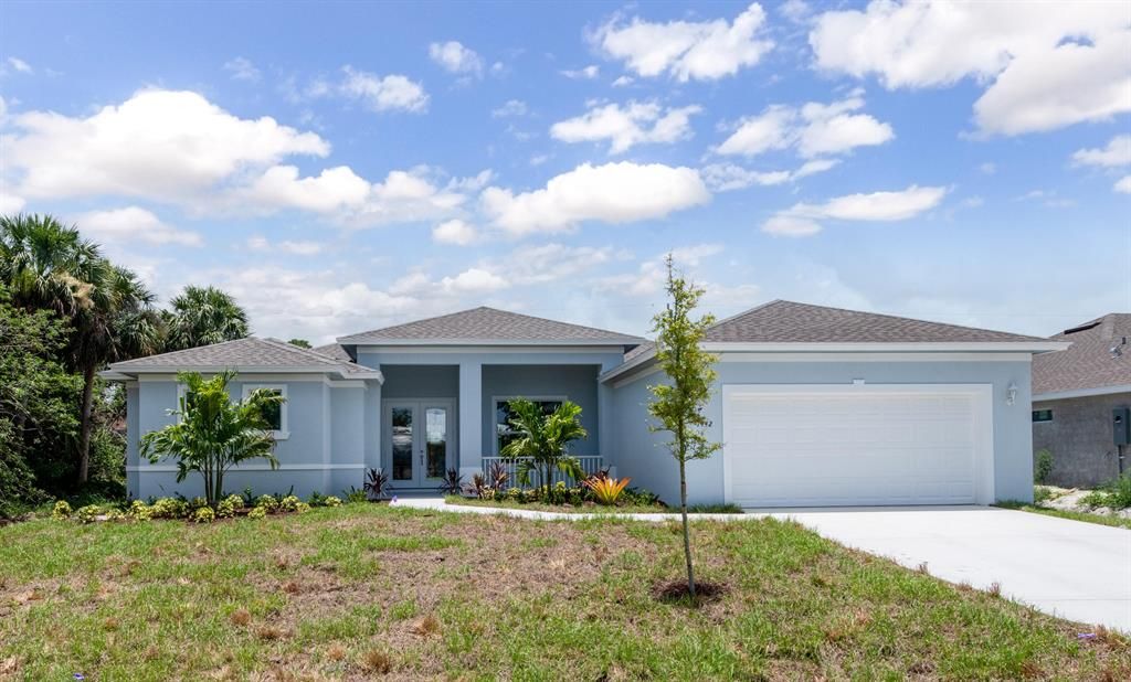 Photo of 1442 SW Flounder Lane Ln, Port St Lucie, FL 34953 (MLS # R10767056)