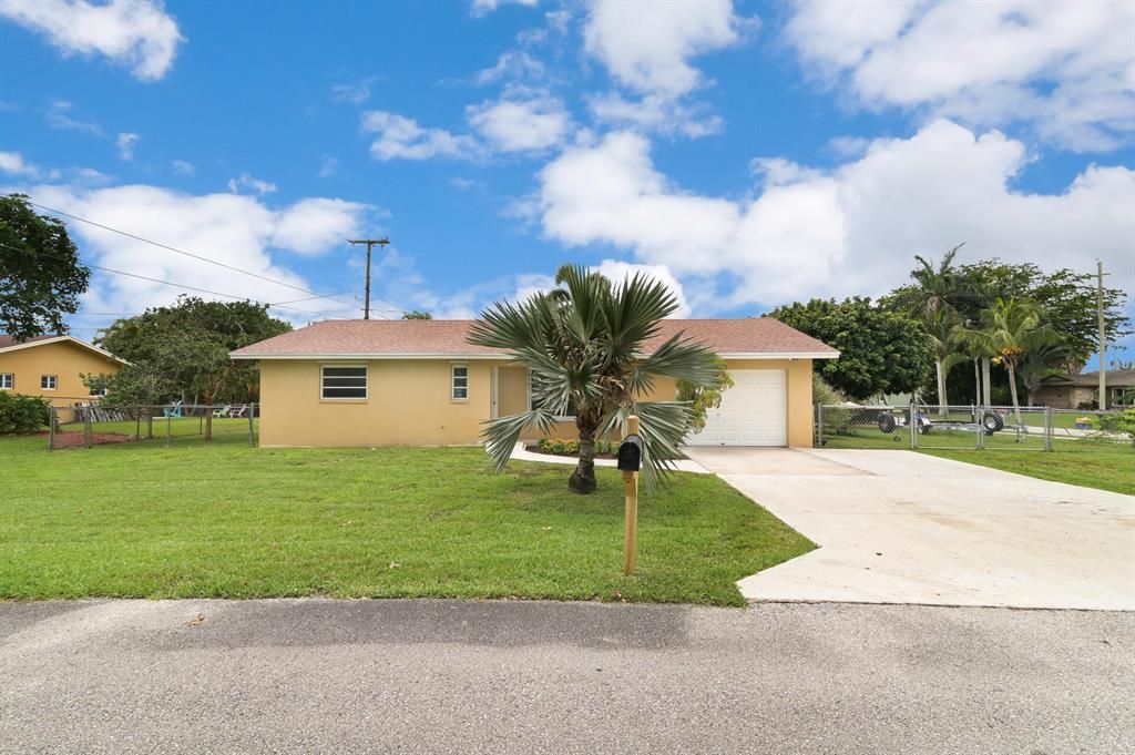 Photo of 9110 Banquet Way Way, Lake Worth Beach, FL 33467 (MLS # R10776363)