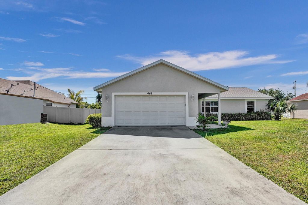 Photo of 662 SW Mccracken Avenue, Port Saint Lucie, FL 34953 (MLS # R11070133)