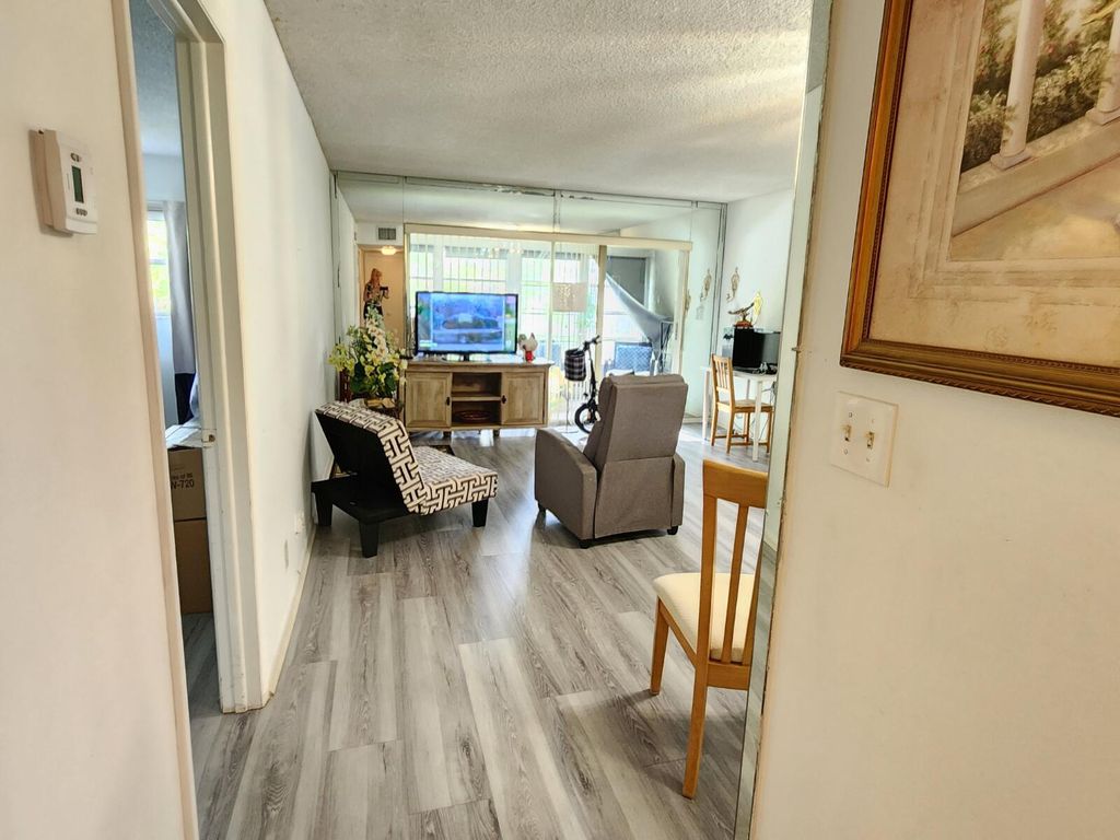 Photo of 8842 W Mcnab Road #205, Tamarac, FL 33321 (MLS # B26010510)