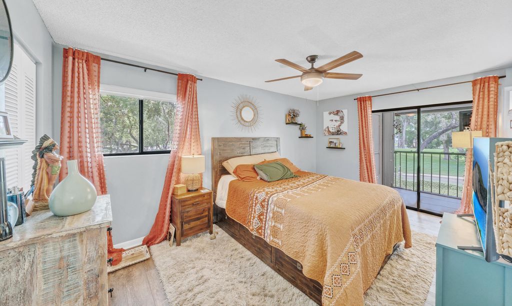 Photo of 15469 Lakes Of Delray Boulevard #202, Delray Beach, FL 33484 (MLS # B26004016)