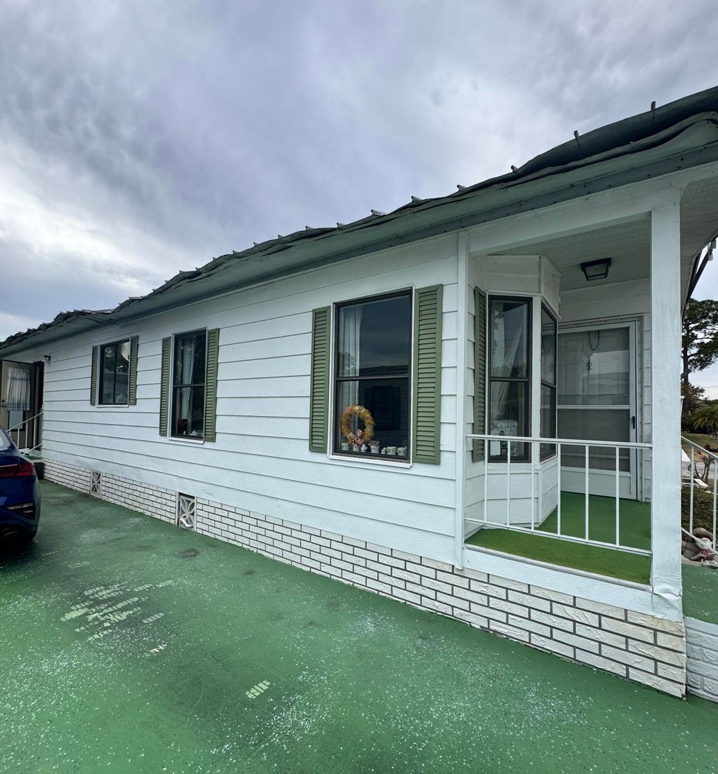 Photo of 6 La Puerta Del Norte, Fort Pierce, FL 34951 (MLS # R11163090)