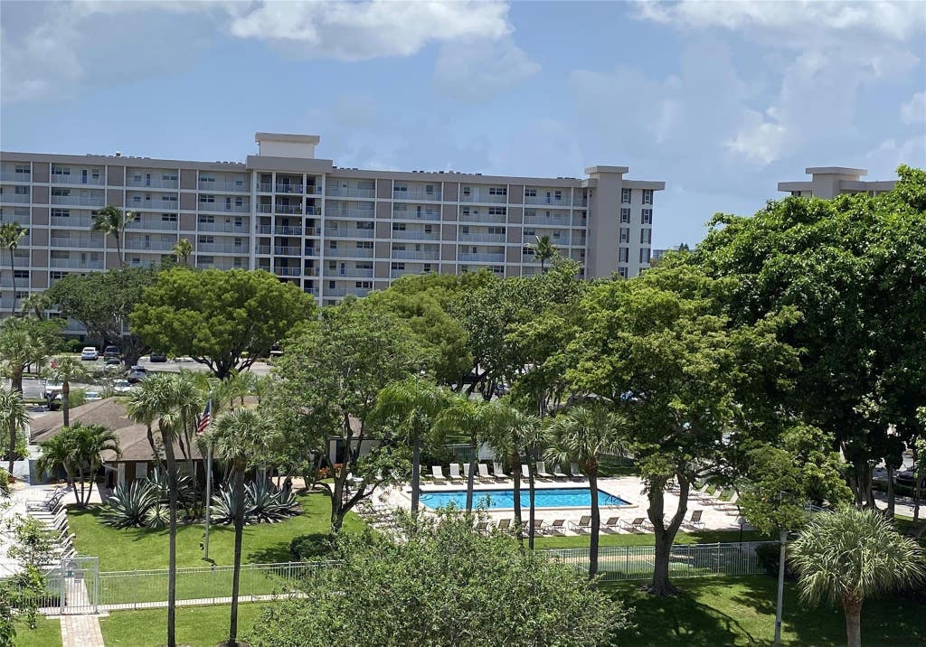 Photo of 2671 S Course Drive #602, Pompano Beach, FL 33069 (MLS # B26038784)