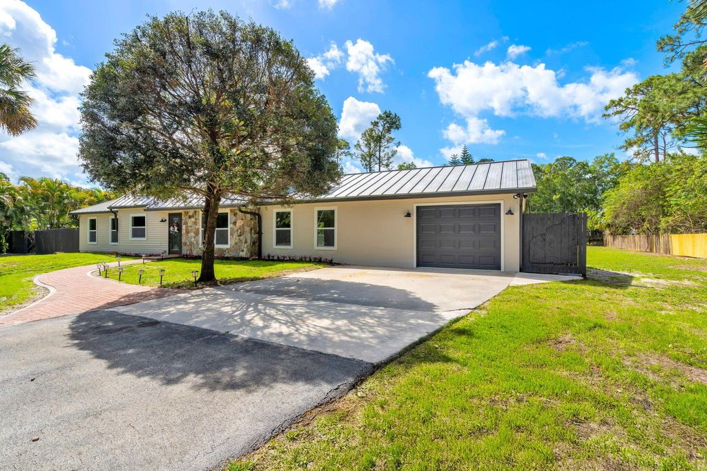 Photo of 11614 41st Court N, West Palm Beach, FL 33411 (MLS # R11079069)