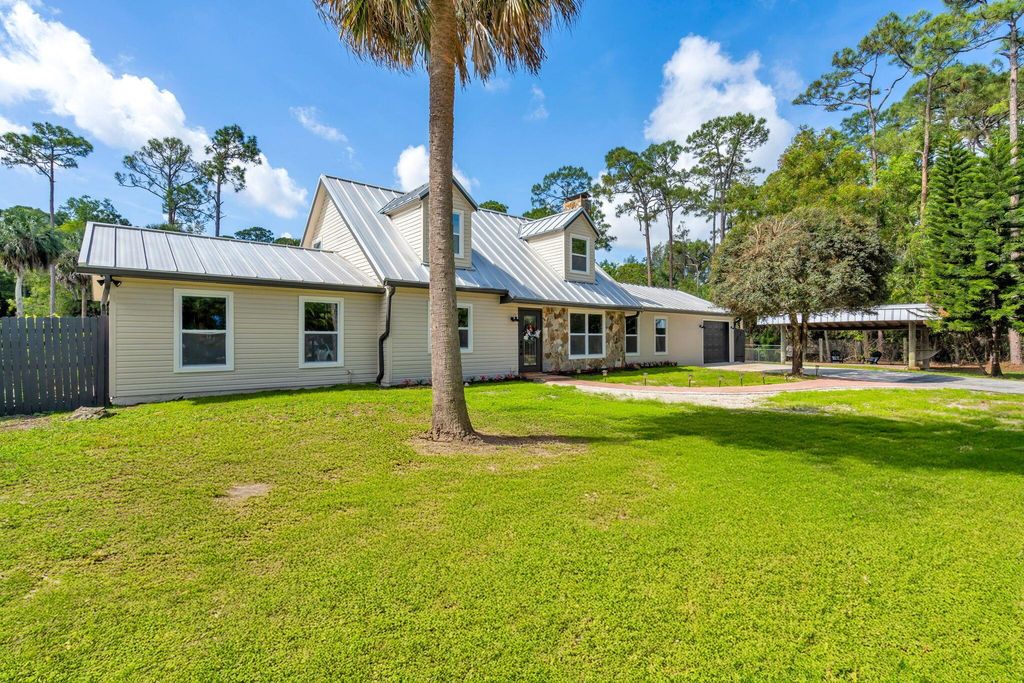 Photo of 11614 41st Court N, West Palm Beach, FL 33411 (MLS # R11079069)