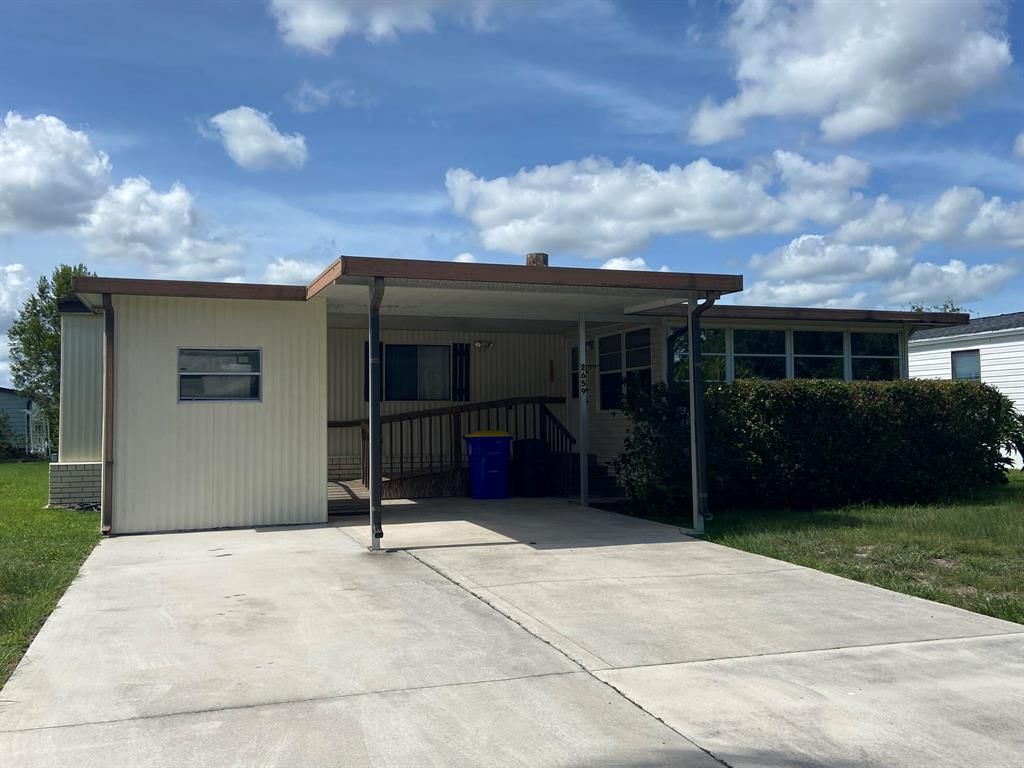 Photo of 2659 SW Monarch Trail Trl, Stuart, FL 34997 (MLS # R10810149)