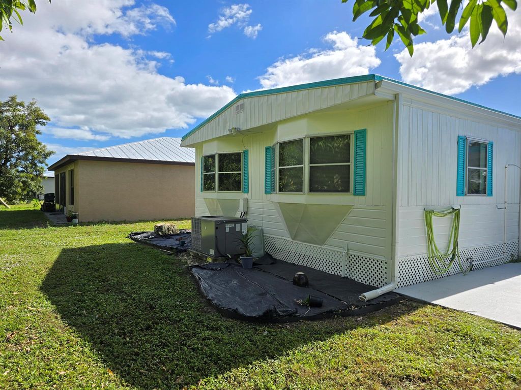 Photo of 6 Mediterranean Boulevard N, Port Saint Lucie, FL 34952 (MLS # R11037856)