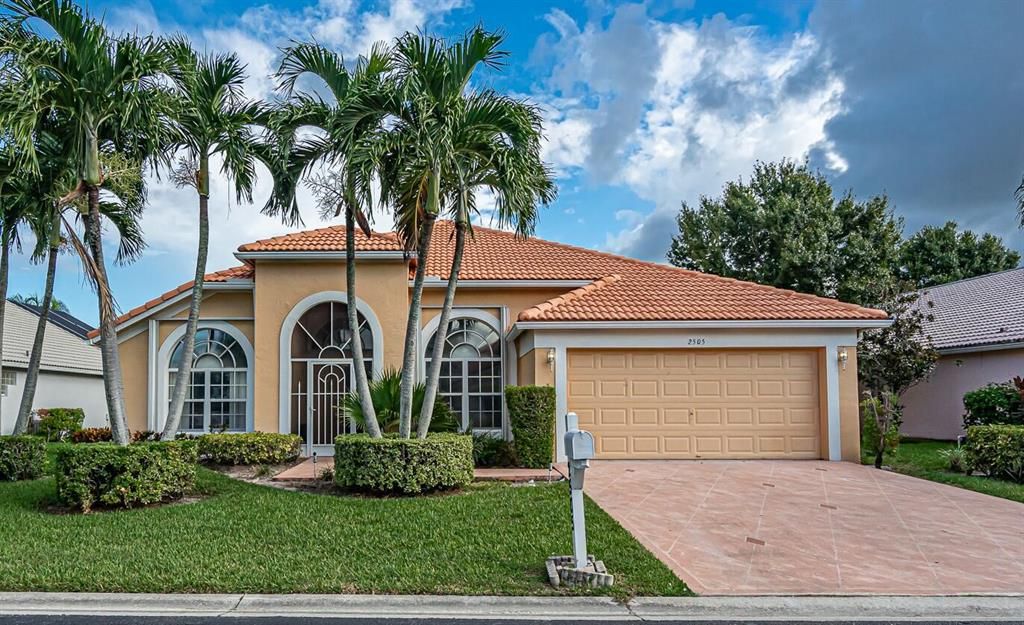 Photo of 2505 Egret Lake Drive Dr, Green Acres, FL 33413 (MLS # R10750447)