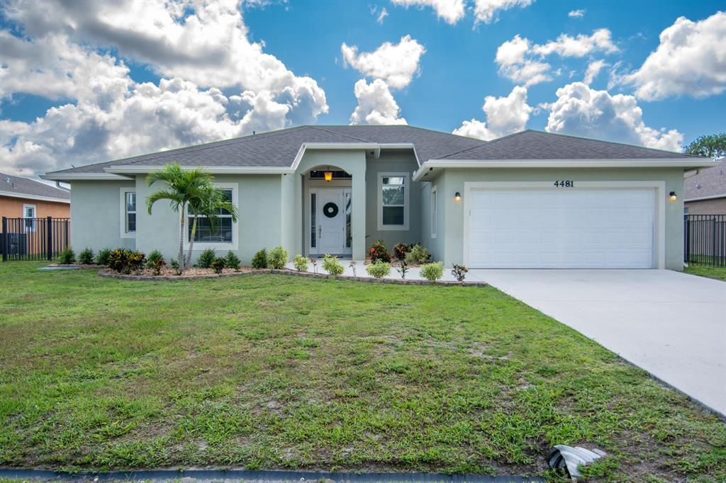 Photo of 4481 SW Hagaplan Street, Port St Lucie, FL 34953 (MLS # R10892293)