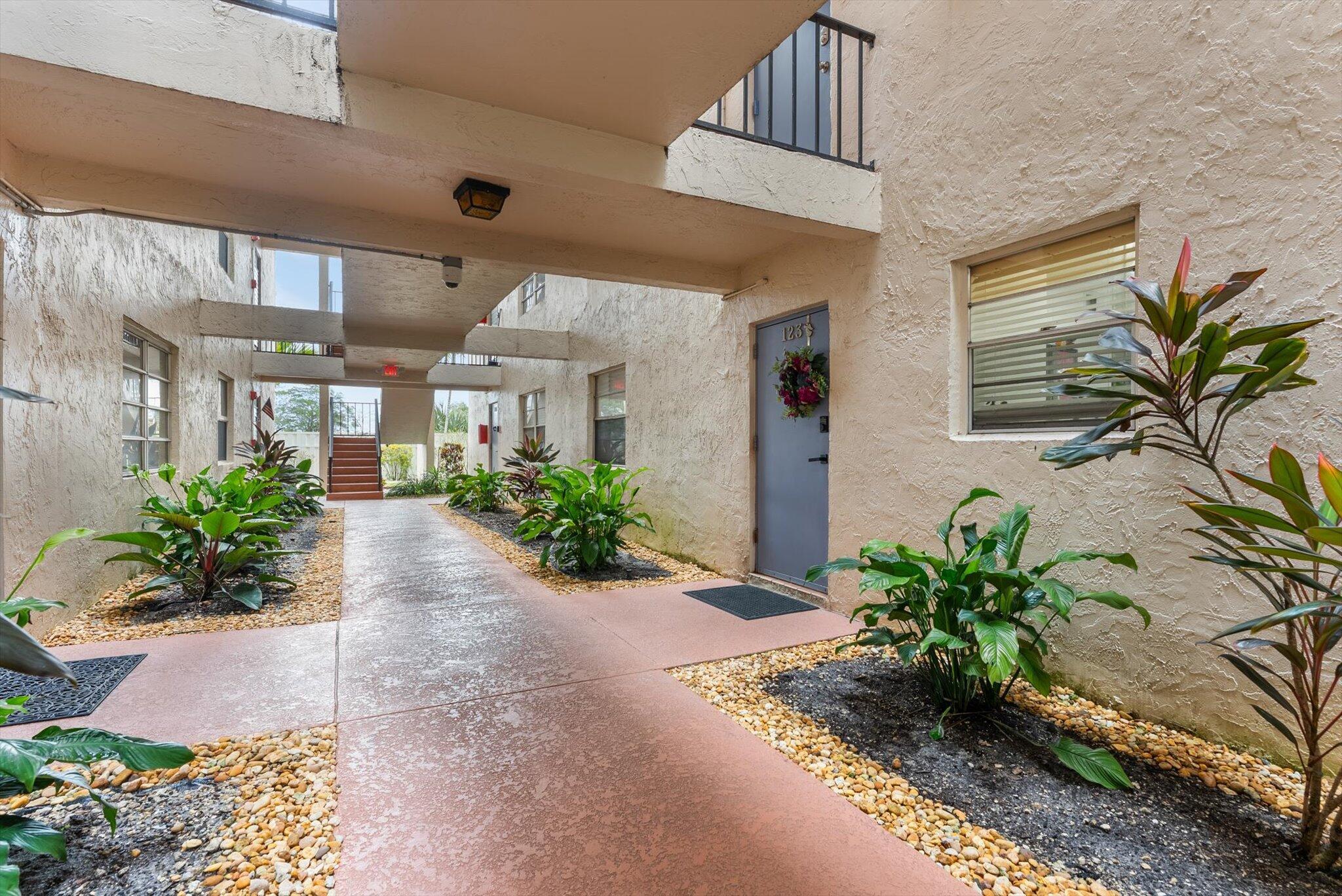Stunning First-Floor Poolside Condo in Sought-After 55+ Community. Welcome to your dream retreat! This completely renovated first-floor unit offers the perfect blend of luxury, comfort, and convenience -- all just steps from the sparkling pool. Step inside to discover gorgeous marble floors throughout, setting an elegant tone from the moment you enter.The bright, modern white kitchen is a showstopper, featuring sleek cabinetry, quartz countertops-- perfect for both everyday living and entertaining.  Brand new A/C and Water Heater!!!Low HOA fees make this an exceptional value, while the well-maintained community offers the lifestyle you've been dreaming of. Location is a dream !! 50 YEARS CERTIFICATION IS COMPLETED. THIS UNIT HAS THE BEST ASSIGNED PARKING SPOT !!