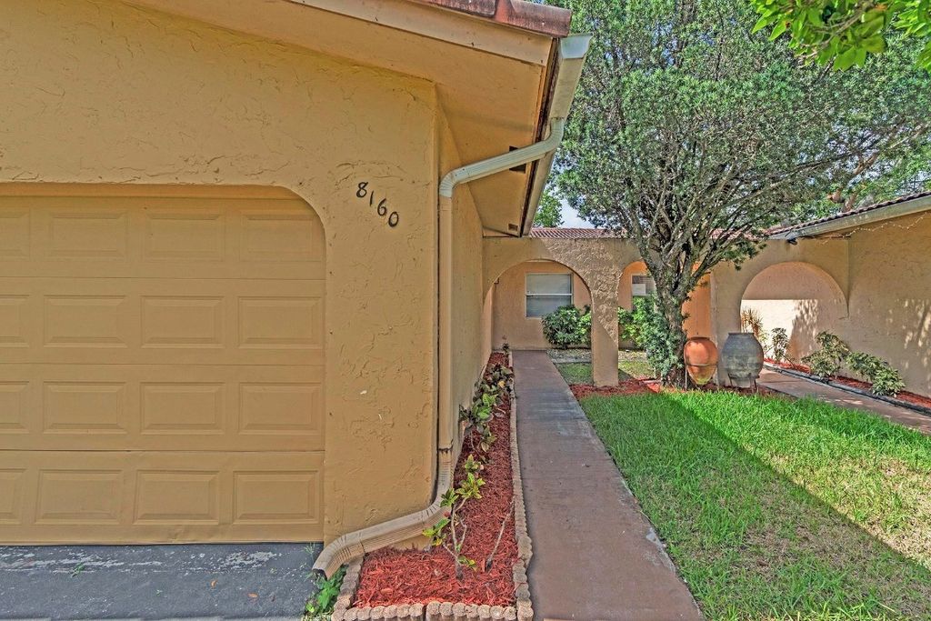 Photo of 81608170 NW 40th Street, Coral Springs, FL 33065 (MLS # F10513325)