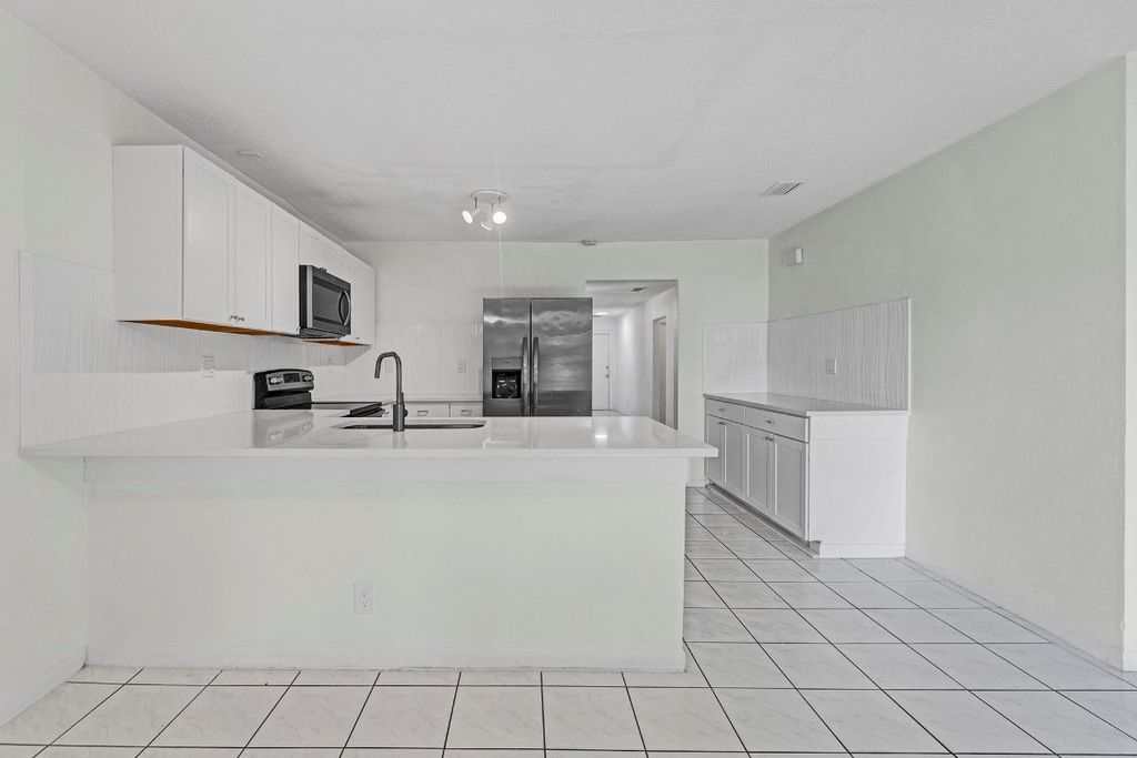 Photo of 81608170 NW 40th Street, Coral Springs, FL 33065 (MLS # F10513325)