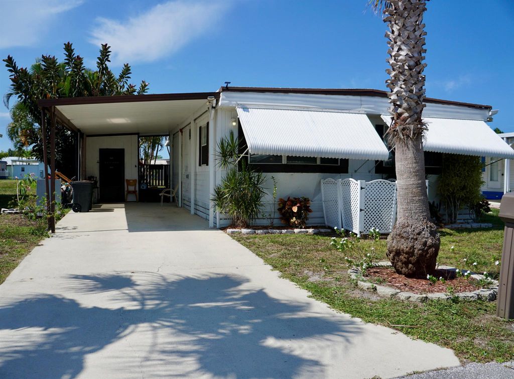 Photo of 64 SE Spanish Way, Port Saint Lucie, FL 34952 (MLS # R10994354)