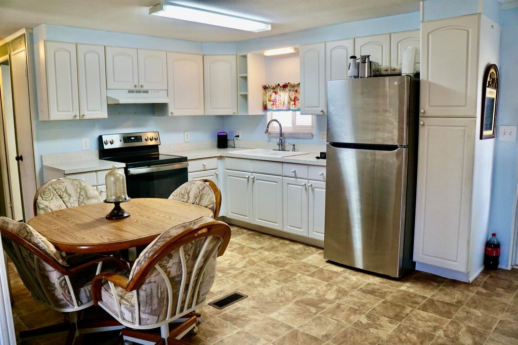 Photo of 64 SE Spanish Way, Port Saint Lucie, FL 34952 (MLS # R10994354)