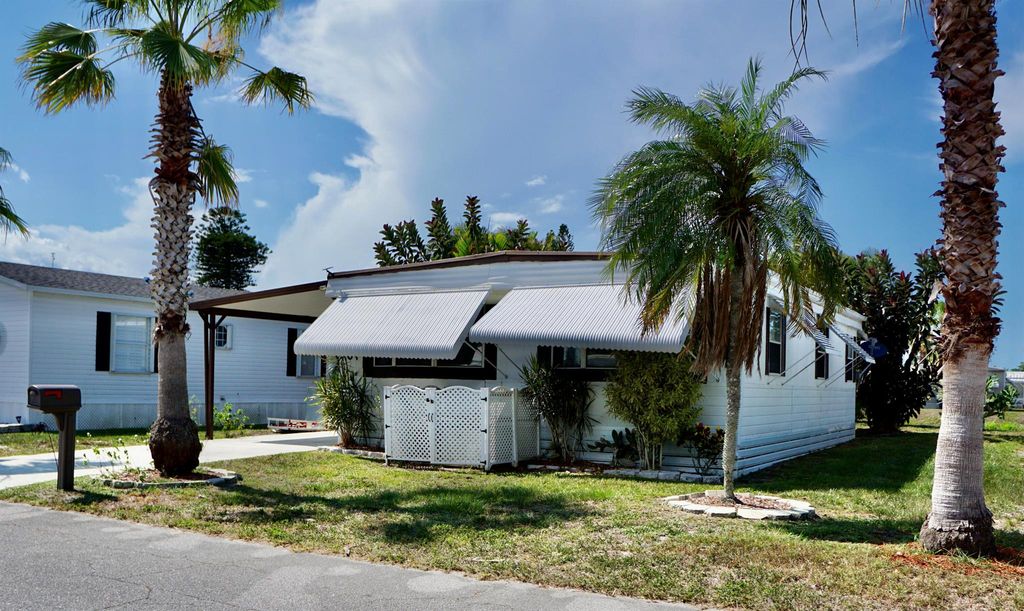 Photo of 64 SE Spanish Way, Port Saint Lucie, FL 34952 (MLS # R10994354)