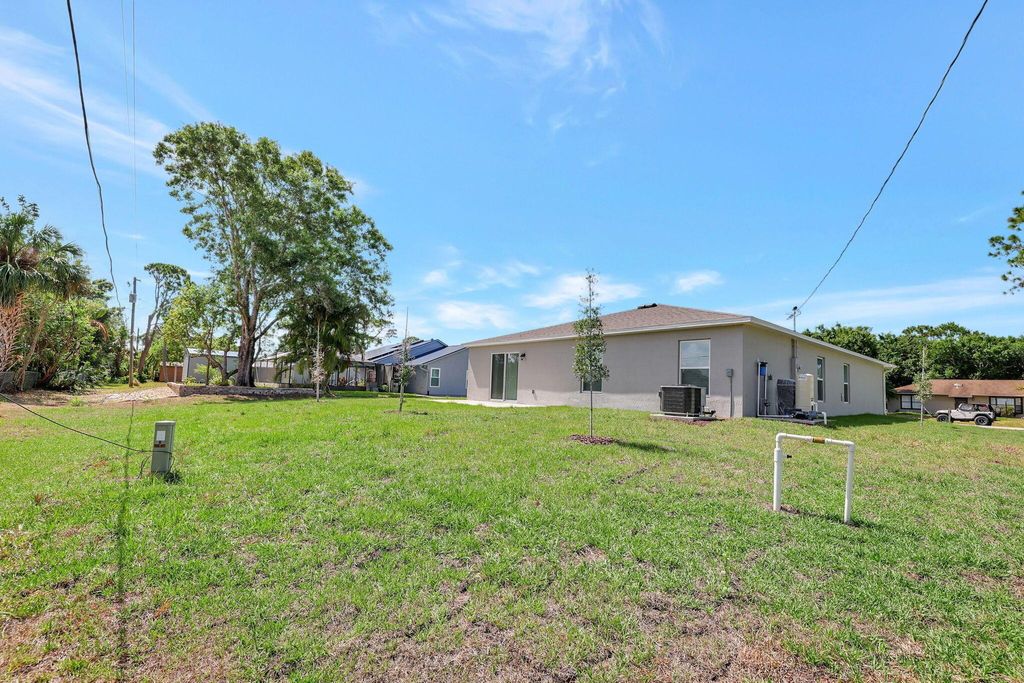 Photo of 6601 Deland Avenue, Fort Pierce, FL 34951 (MLS # R11085560)