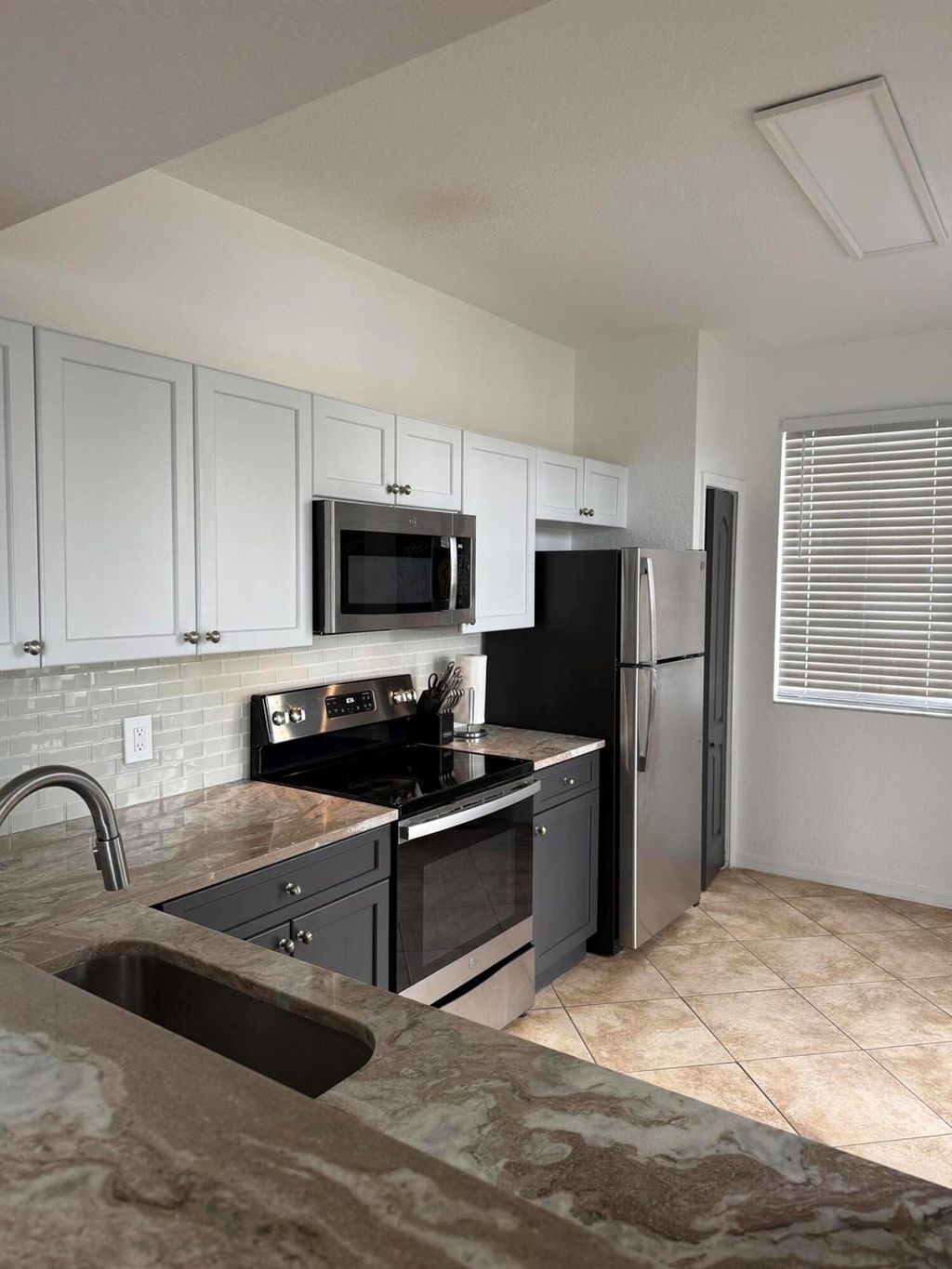 Photo of 11037 Legacy Boulevard #101, Palm Beach Gardens, FL 33410 (MLS # R11064979)