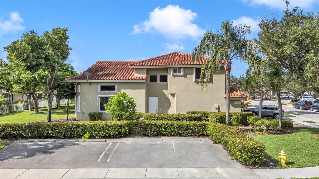 Photo of 12502 NW 56th St #12502, Coral Springs, FL 33076 (MLS # F10500908)