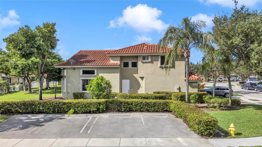 Photo of 12502 NW 56th Street #12502, Coral Springs, FL 33076 (MLS # F10500908)